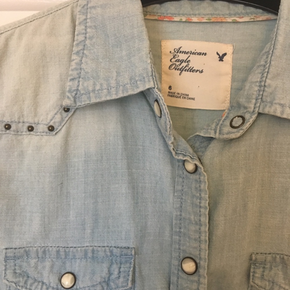 Denim shirt.